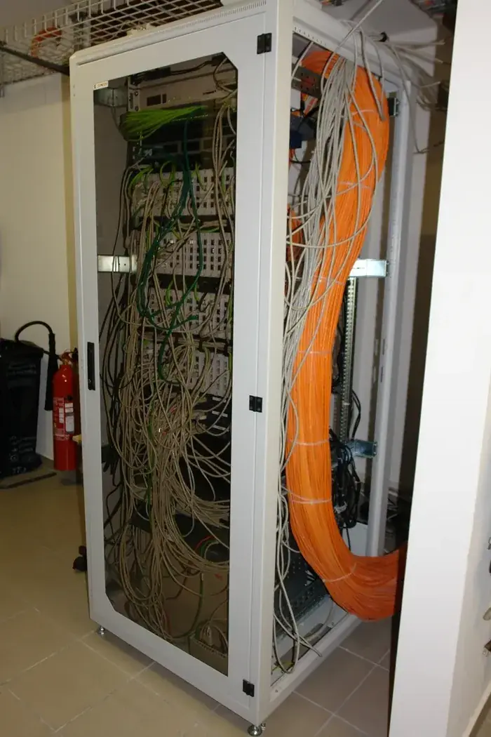 Network cabinet with managed switches